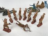 a lot of figurines that are sitting on a table