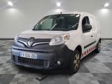 la photo d'une camionnette blanche garée dans un garage