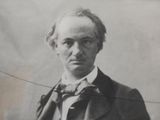 portrait of a black and white photo of a man in a suit and bow tie