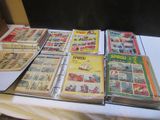 a lot of comic books on a table