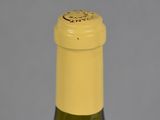 close up of a bottle of wine with a cork on the top