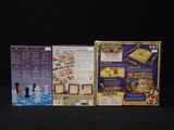 three boxed games are shown on a black surface