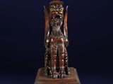 an antique wooden table with a lion on top of it