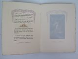 an open book with a picture of a woman on it