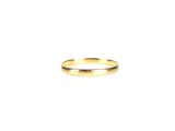 a gold wedding ring on a white background