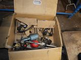 a box full of tools sitting on the floor