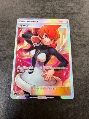 a close up of a pokemon trading card on a table