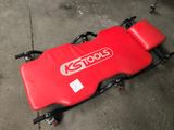 a close up of a red seat on top of a red cart