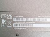 a close up of a laptop with a barcode on it