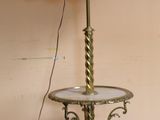 a small table with a lamp on top of it