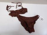 two pieces of underwear are laying on a white surface