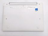 a white laptop with a blue sticker on it