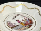 a plate with a picture of a man and a woman on it