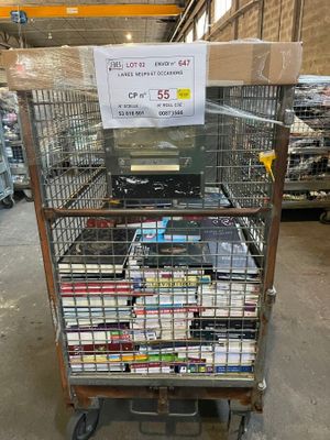a cart full of books in a store with a sign on it