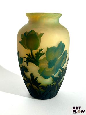a vase that has a picture of a flower on it