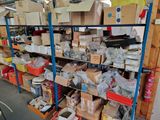 many boxes of assorted items on the shelves