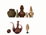 many different types of vases displayed on a shelf