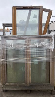 a large glass case sitting on top of a pallet