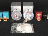a small collection of miniature toys including a camera and other items