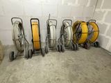 several different types of hoses are lined up in a row