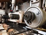 an image of a machine that is working on a piece of wood