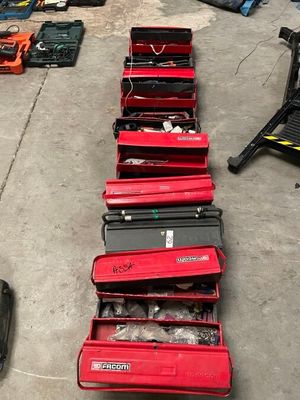 a lot of tools that are sitting on the floor