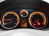 a close up of a car dashboard with various gauges