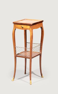 an image of a side table with a basket on it