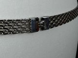 a close up of a belt with a metal buckle