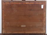 an old suitcase sitting on top of a wooden table