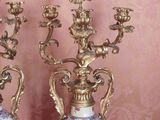 two vases that are sitting on a table