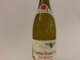 a bottle of wine that is sitting on a table