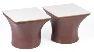 pair of brown and white ceramic stools on a white background