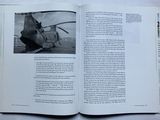 an open book with a picture of a helicopter on it