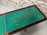 a table that has a roule game on top of it