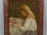 tableau représentant une jeune fille en train de lire un livre, dans un cadre en bois