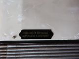 a close up of a piece of luggage with a label on it