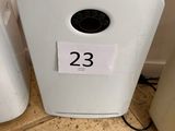 a picture of a white air purifier with the number 23 on it
