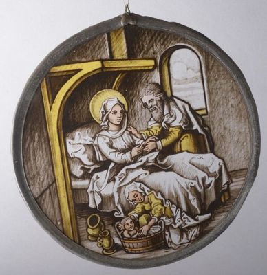 a picture of a christmas ornament with a picture of a man and a woman