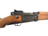 a close up of a rifle on a white background