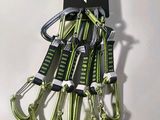 a set of five green carabines hanging from a hook
