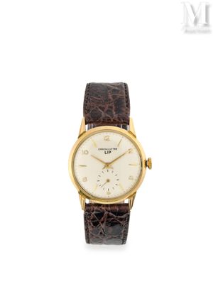 une montre-bracelet en or jaune 18 carats avec un cadran blanc