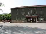 an image of a building with a sign on the front of it