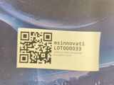a sticker on a piece of paper with a qr code on it