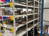 a lot of shelves that have various items on them