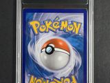 a close up of a pokemon card on a table