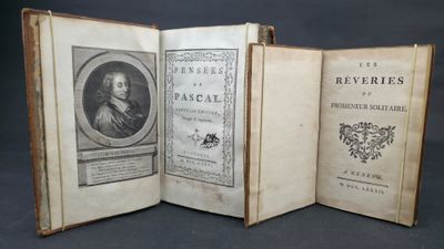 an open book with a picture of a man on it