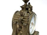 a clock that is sitting on top of a stand