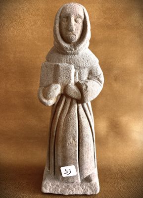 a statue of a woman with a hood on