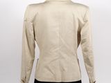 the back of a beige jacket on a mannequin mannequin mannequin mannequin mann